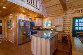 Armstrong Luxury Log Vacation  At Windcliff 4 Bedroom Home by RedAwnin