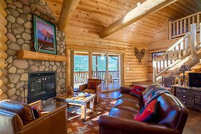 Armstrong Luxury Log Vacation  At Windcliff 4 Bedroom Home by RedAwnin