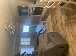 Newly Renovated 102 2BD Condo with Riverview Balcony by RedAwning