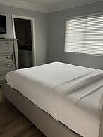 Newly Renovated 102 2BD Condo with Riverview Balcony by RedAwning