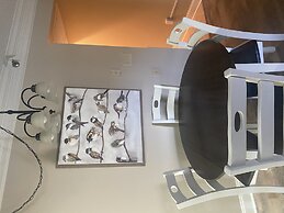 Newly Renovated 102 2BD Condo with Riverview Balcony by RedAwning