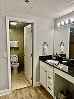 Newly Renovated 102 2BD Condo with Riverview Balcony by RedAwning