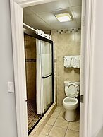 Newly Renovated 102 2BD Condo with Riverview Balcony by RedAwning