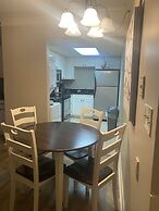 Newly Renovated 102 2BD Condo with Riverview Balcony by RedAwning