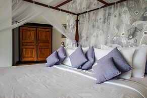 The Flame Tree Estate & Hotel