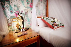 The Flame Tree Estate & Hotel