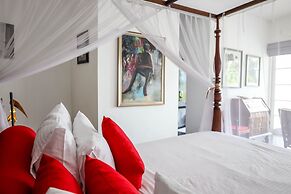 The Flame Tree Estate & Hotel