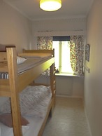 Stora Björnstugan in Laisvallby