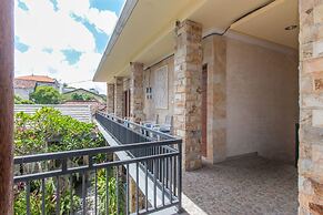 OYO 401 The Frog Homestay Sanur