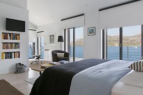 Beachfront Villa Poseidon with Heated Pool