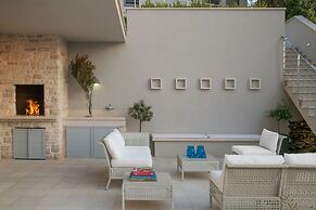 Beachfront Villa Poseidon with Heated Pool