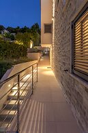 Beachfront Villa Poseidon with Heated Pool