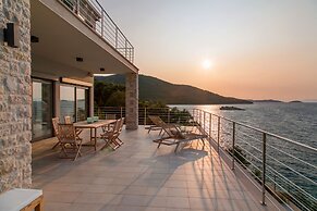Beachfront Villa Poseidon with Heated Pool