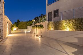 Beachfront Villa Poseidon with Heated Pool