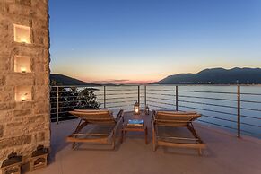 Beachfront Villa Poseidon with Heated Pool