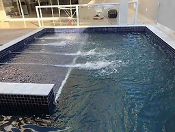 Casa com piscina em Caraguatatuba