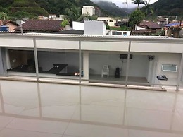 Casa com piscina em Caraguatatuba