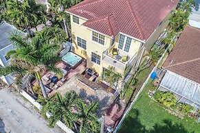 Walk to Beach Spacious Estate with Hot Tub & Game Room