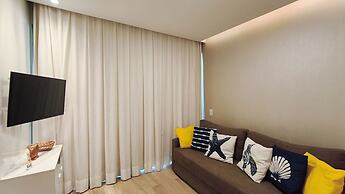 Flats no Beach Class de Muro Alto