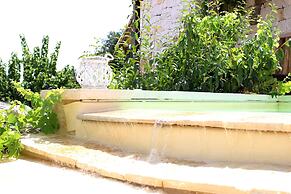 Trullo Madia with Shared Hot Tub in Nature