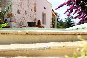 Trullo Madia with Shared Hot Tub in Nature