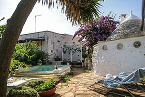 Trullo Madia with Shared Hot Tub in Nature