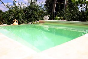 Trullo Madia with Shared Hot Tub in Nature