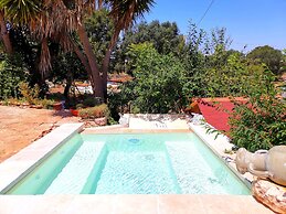 Trullo Madia with Shared Hot Tub in Nature
