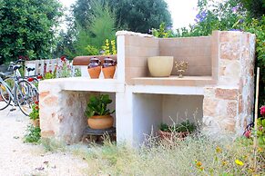 Trullo Madia with Shared Hot Tub in Nature