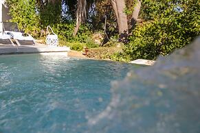 Trullo Madia with Shared Hot Tub in Nature