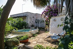 Trullo Madia with Shared Hot Tub in Nature