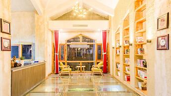 Floral Hotel Fenghuang Huercaowu