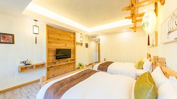 Floral Hotel Fenghuang Huercaowu