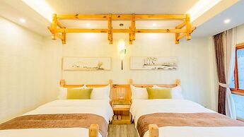 Floral Hotel Fenghuang Huercaowu