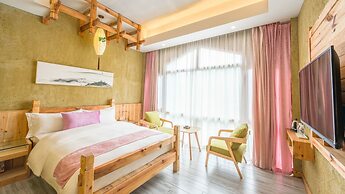 Floral Hotel Fenghuang Huercaowu