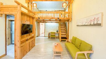 Floral Hotel Fenghuang Huercaowu