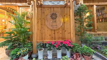 Floral Hotel Fenghuang Huercaowu