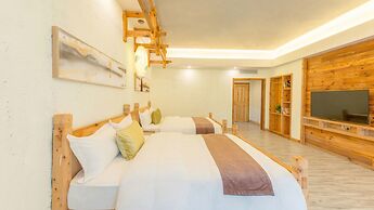 Floral Hotel Fenghuang Huercaowu