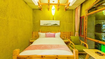 Floral Hotel Fenghuang Huercaowu