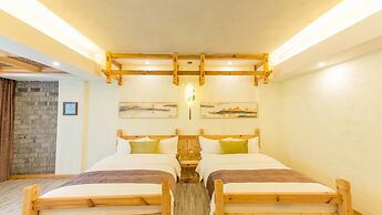 Floral Hotel Fenghuang Huercaowu