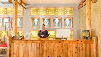 Floral Hotel Fenghuang Huercaowu