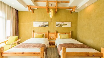 Floral Hotel Fenghuang Huercaowu