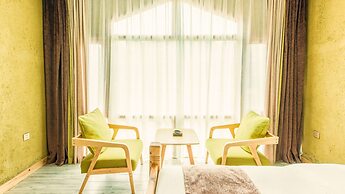 Floral Hotel Fenghuang Huercaowu