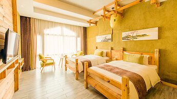 Floral Hotel Fenghuang Huercaowu