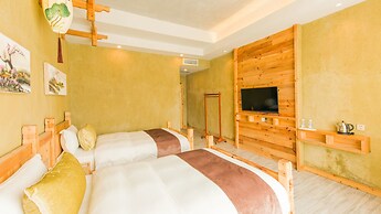 Floral Hotel Fenghuang Huercaowu