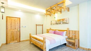 Floral Hotel Fenghuang Huercaowu