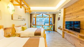 Floral Hotel Fenghuang Huercaowu