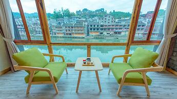 Floral Hotel Fenghuang Huercaowu