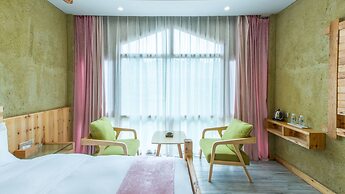 Floral Hotel Fenghuang Huercaowu