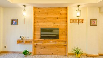 Floral Hotel Fenghuang Huercaowu